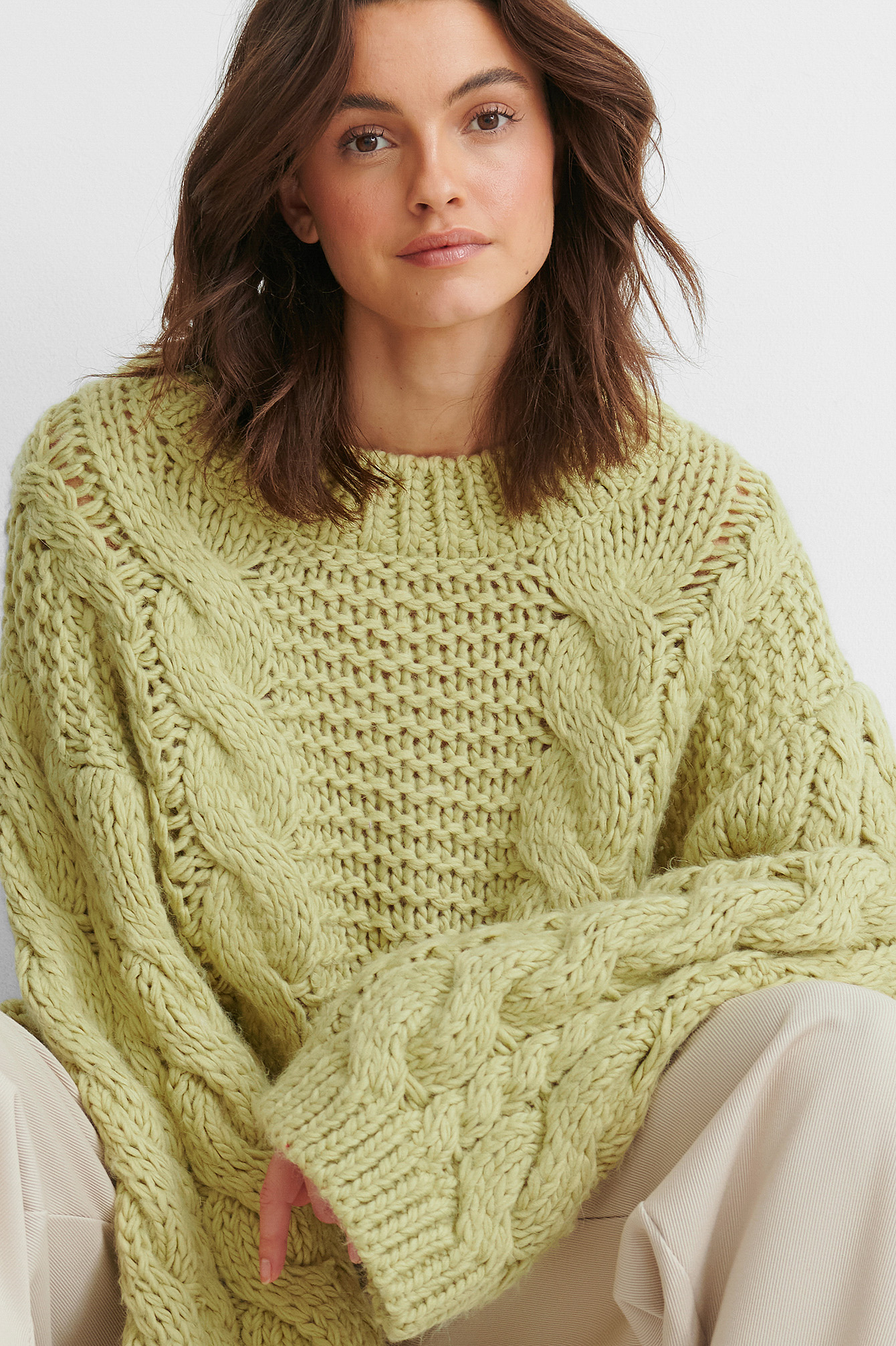 green chunky sweater